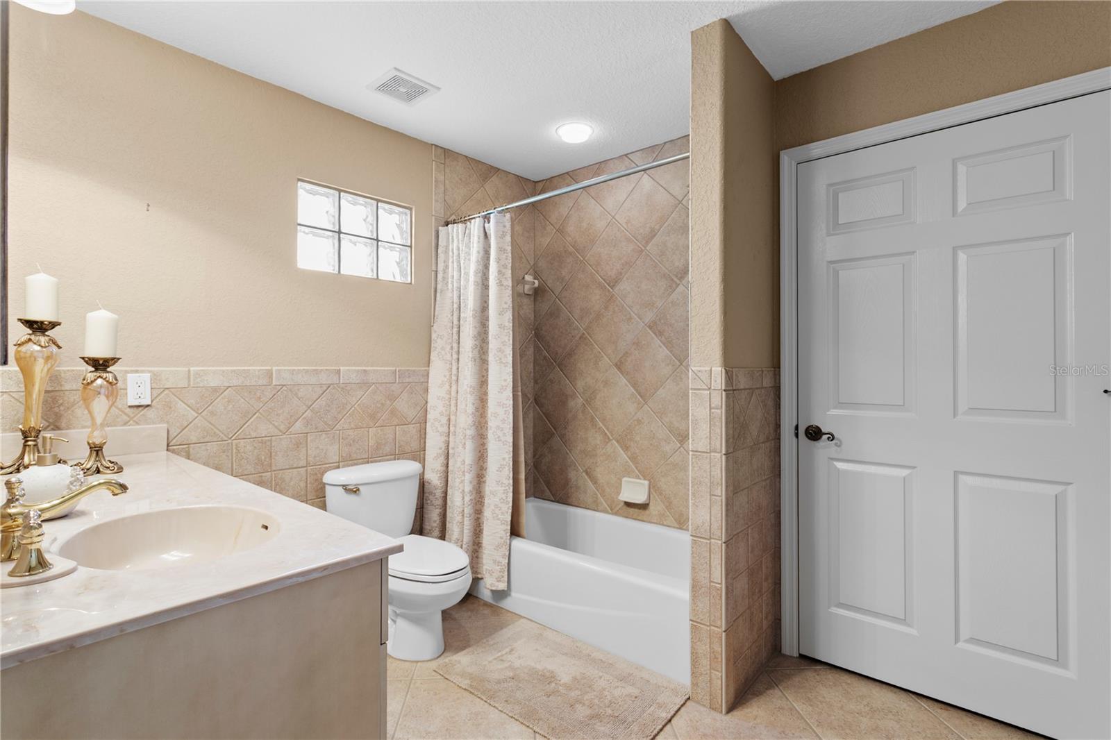 Full Bath to service Guest Bedroom 3 and Flex Room