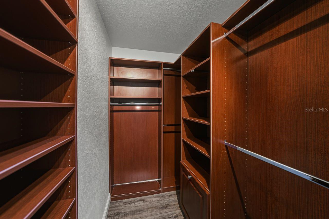 Custom closet with abundance of storage in the primary suite closets.