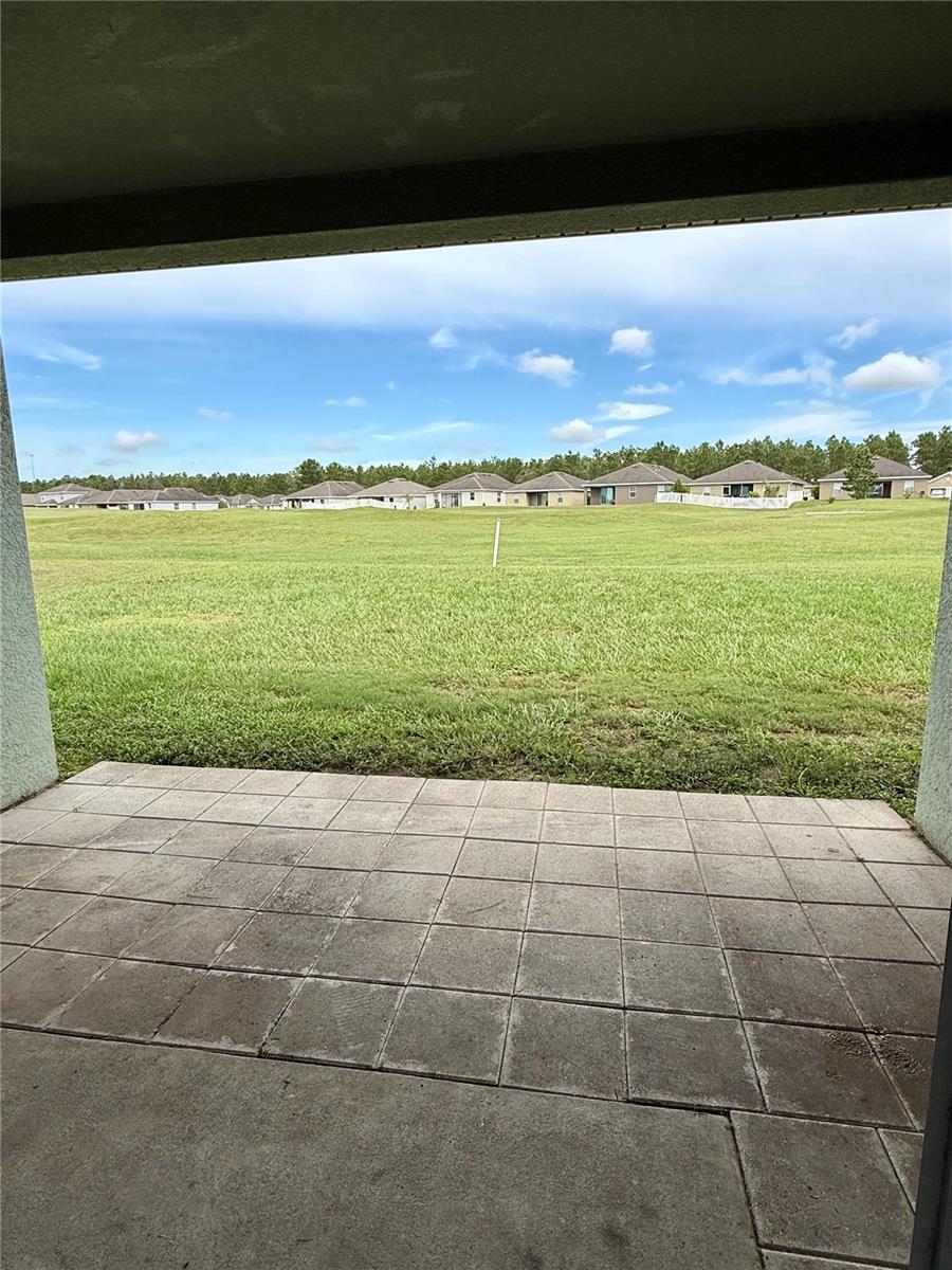 Covered patio overlooking golf course