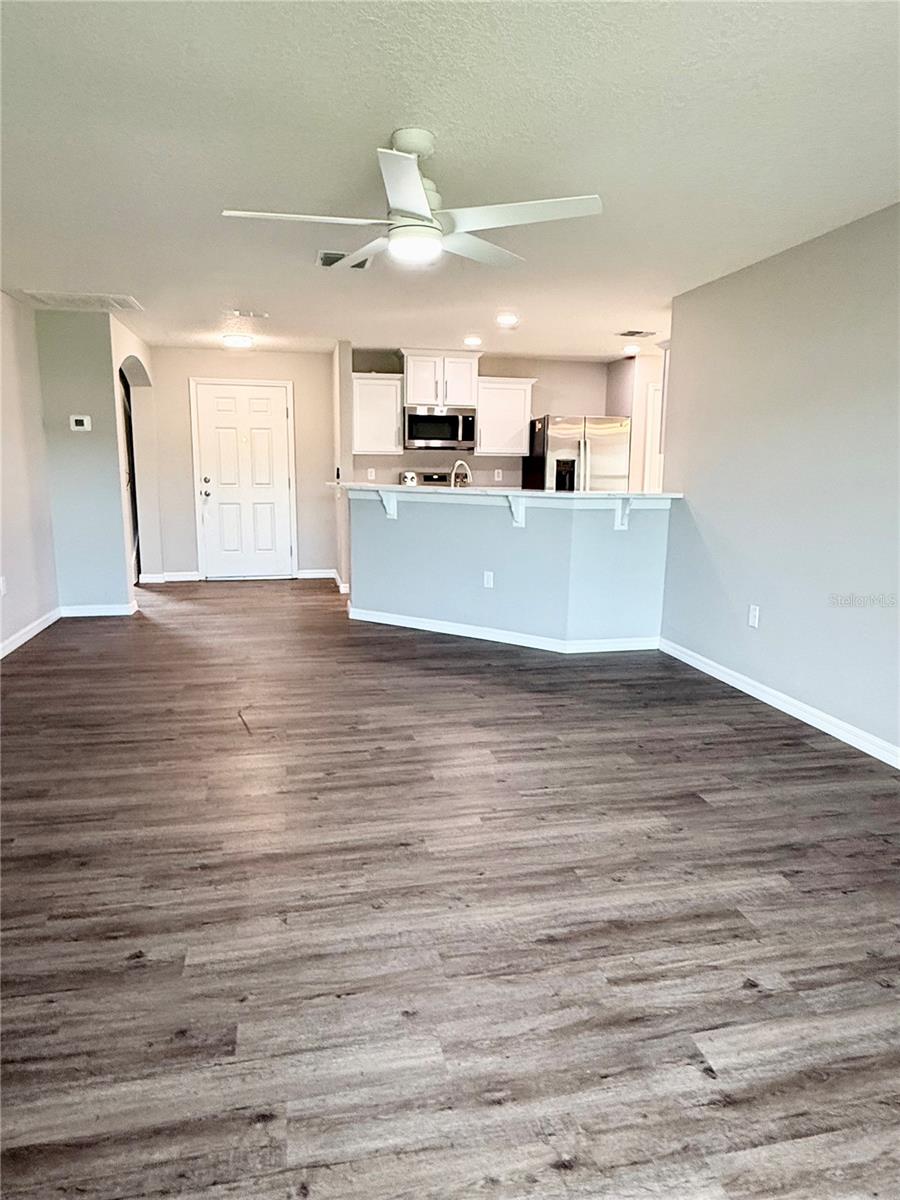 Kitchen overlooks large living room