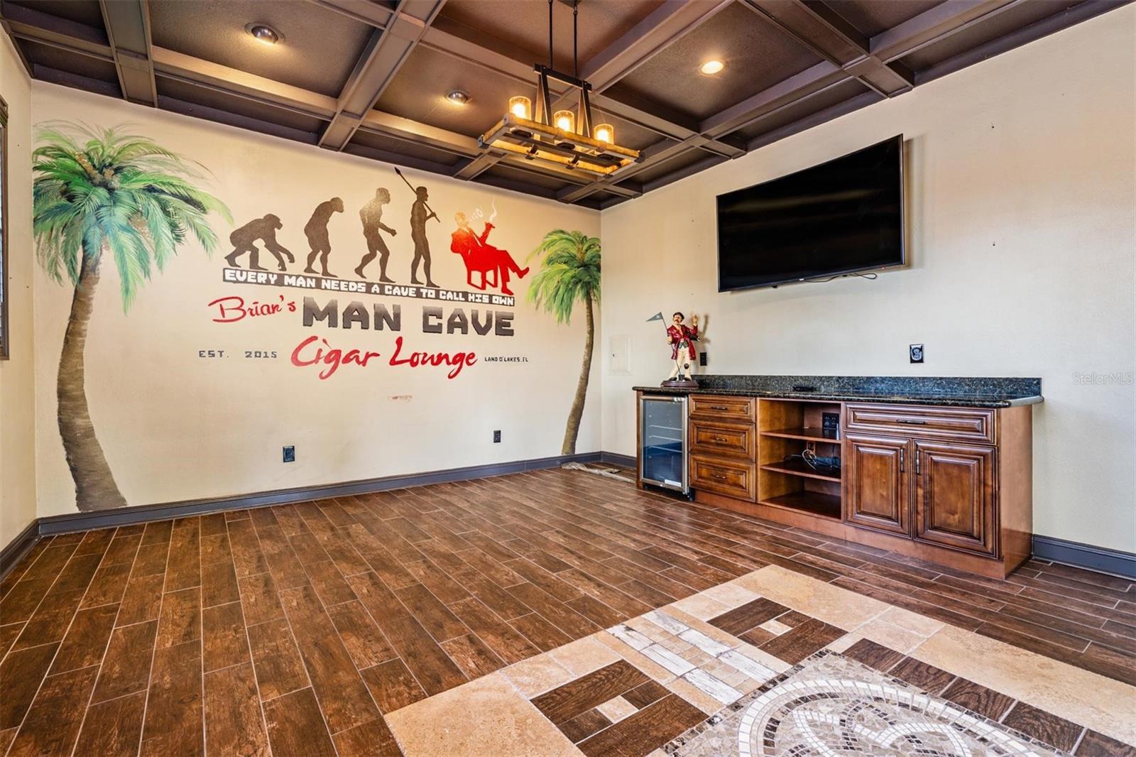 Upstairs separate bonus/game room/man cave with bar