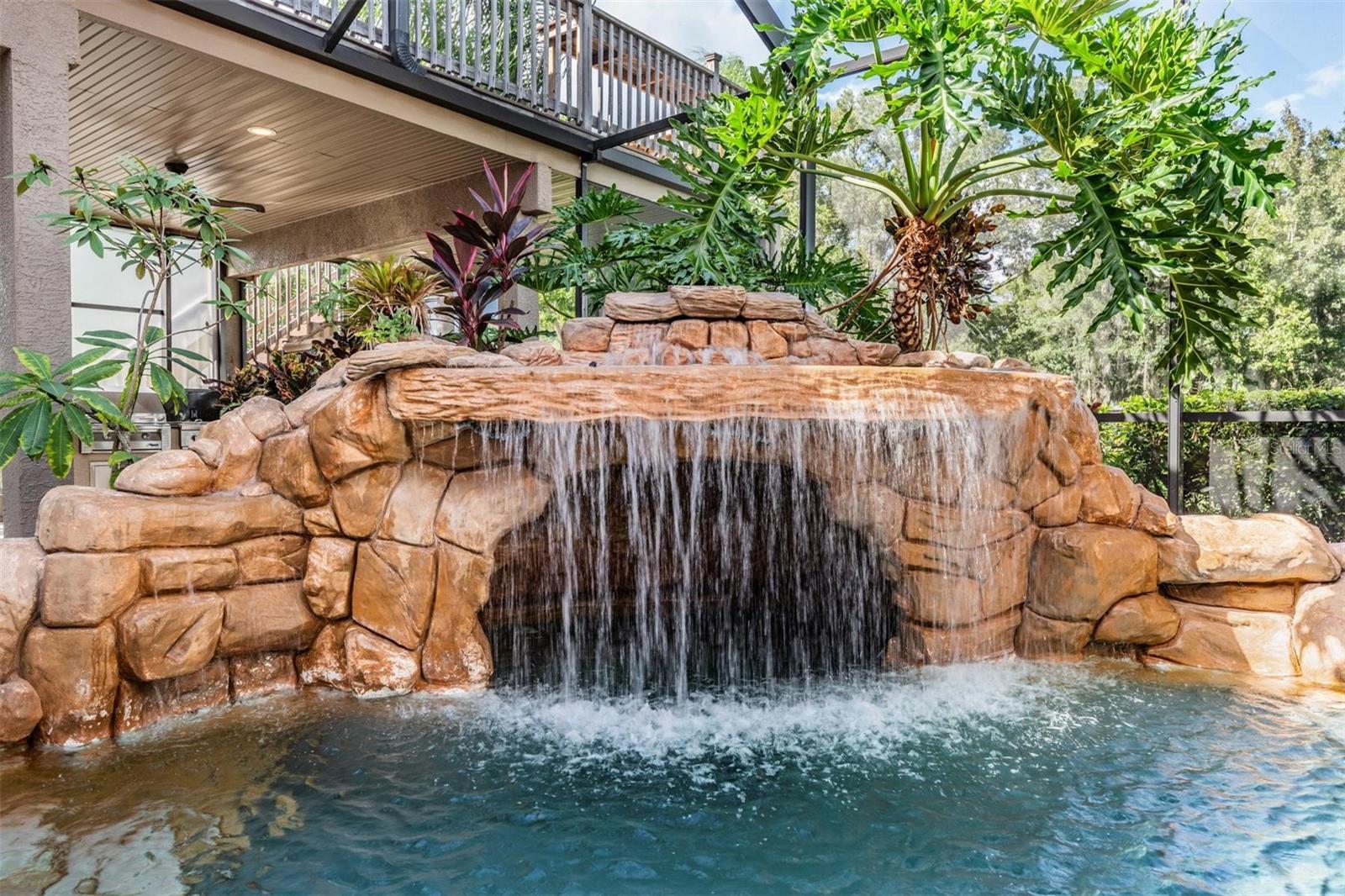 Hot tub with water fall groto