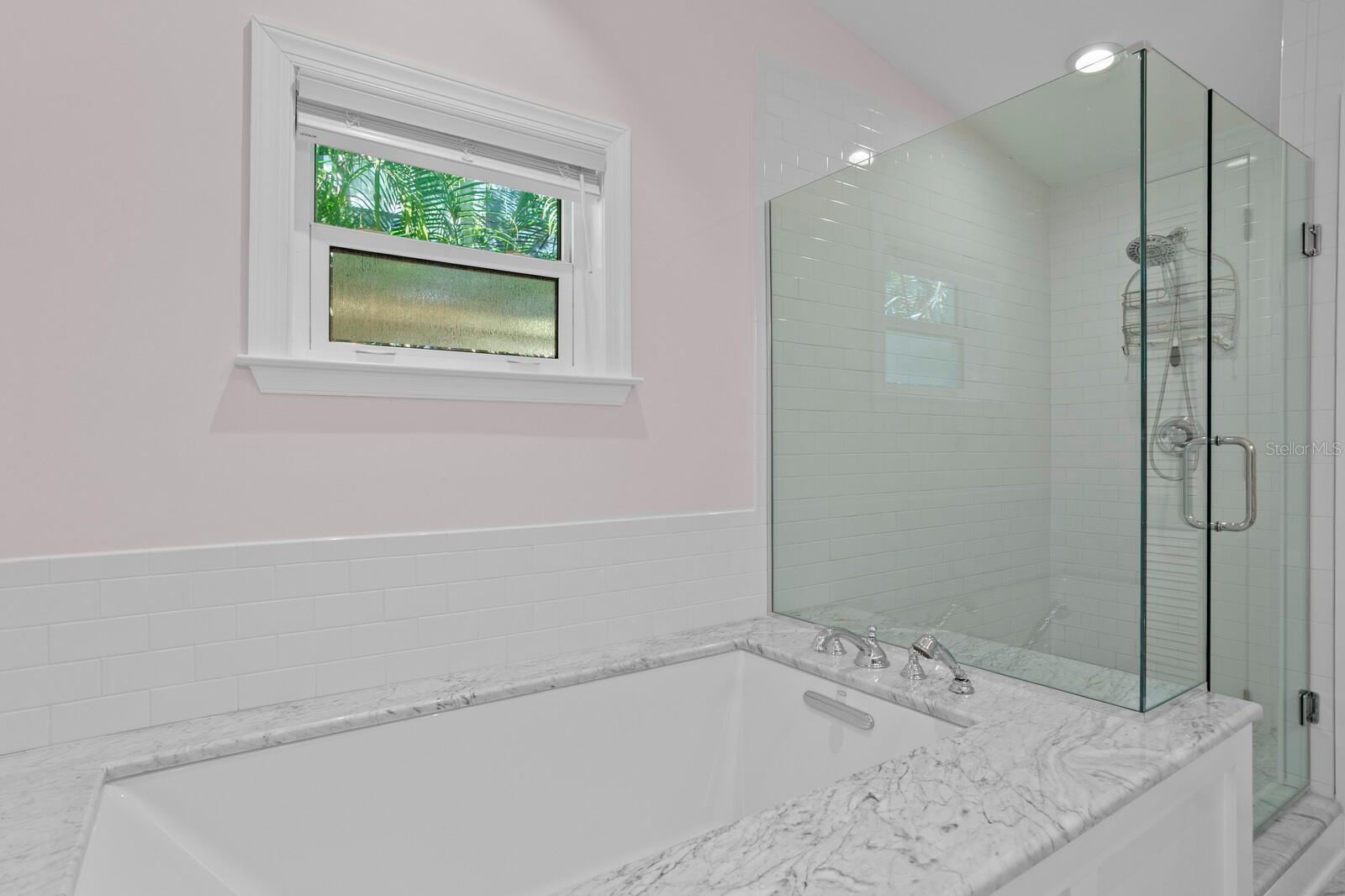 Soak away in luxury in your primary bath.