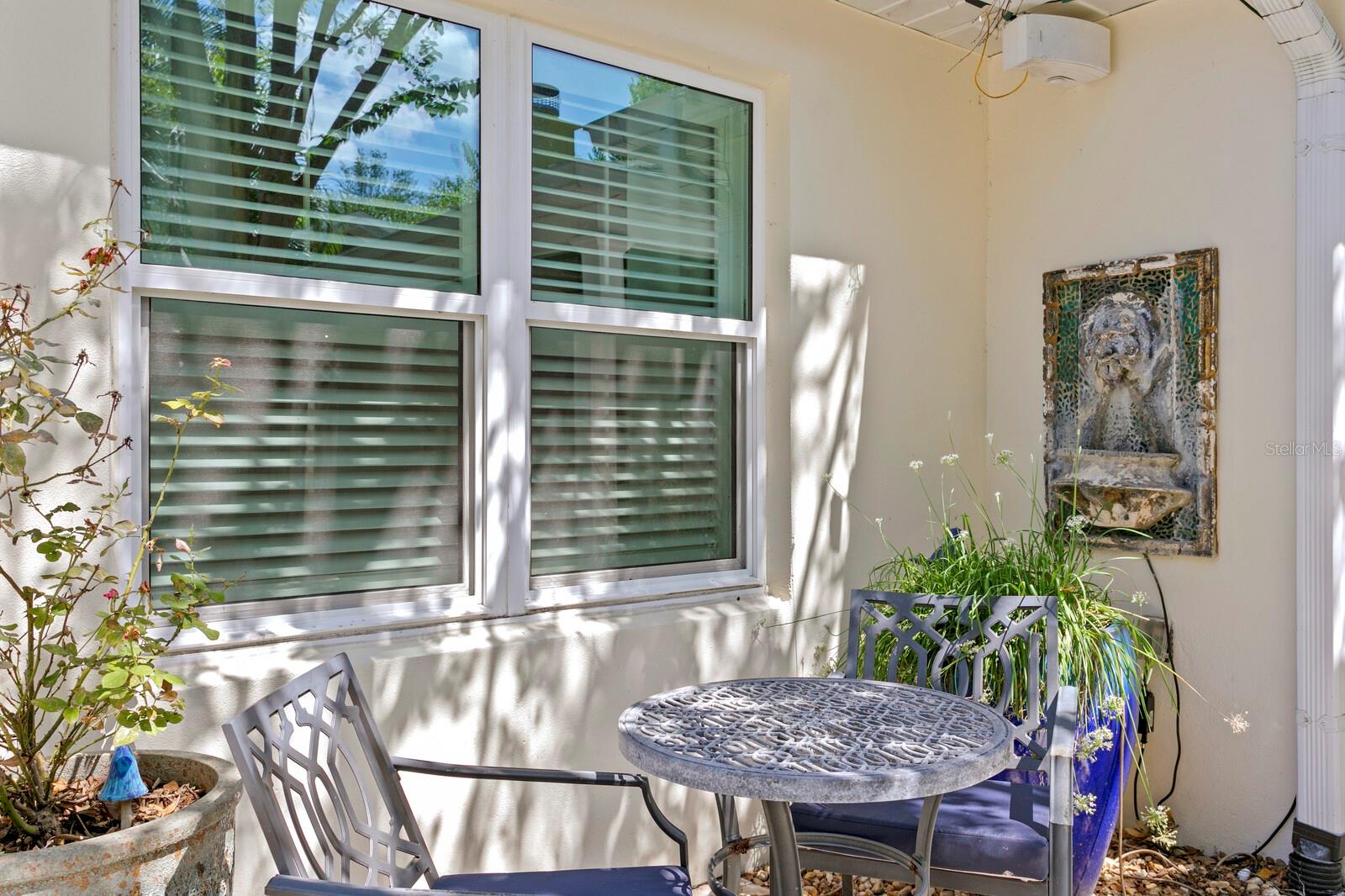 Seating area in backyard.