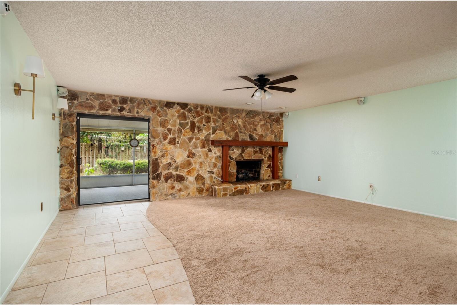 Family room and slider to back screened porch