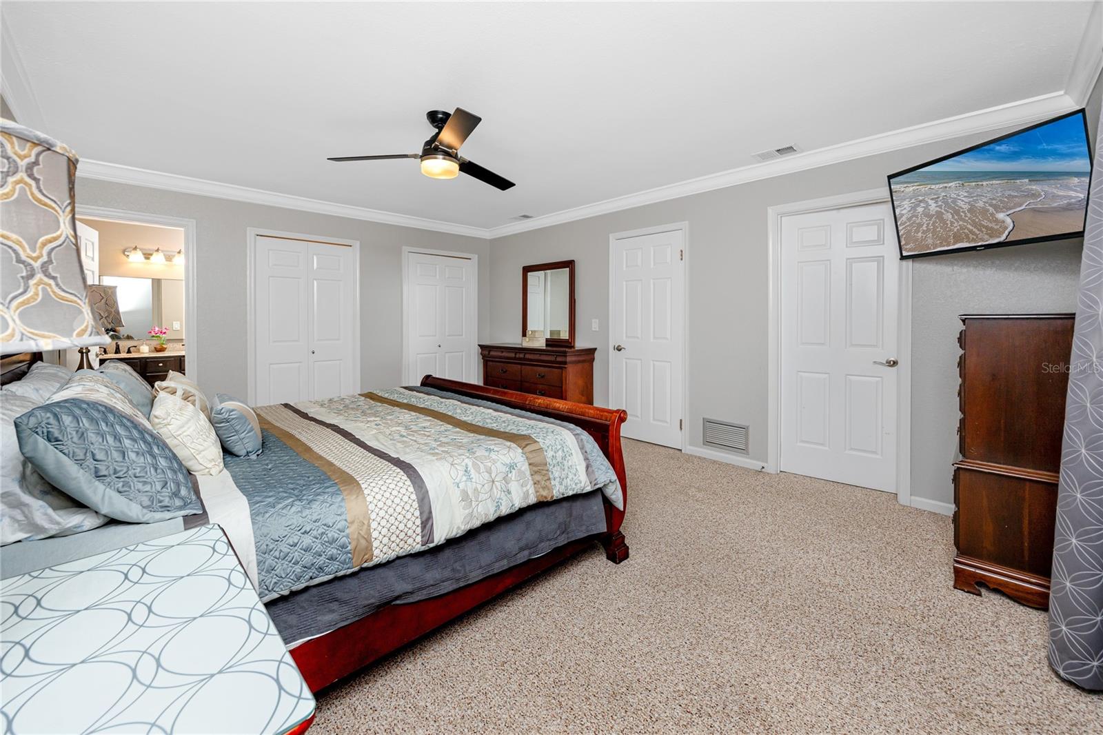 Primary owner bedroom offers three closets. Two reach-in and one walk-in closet.