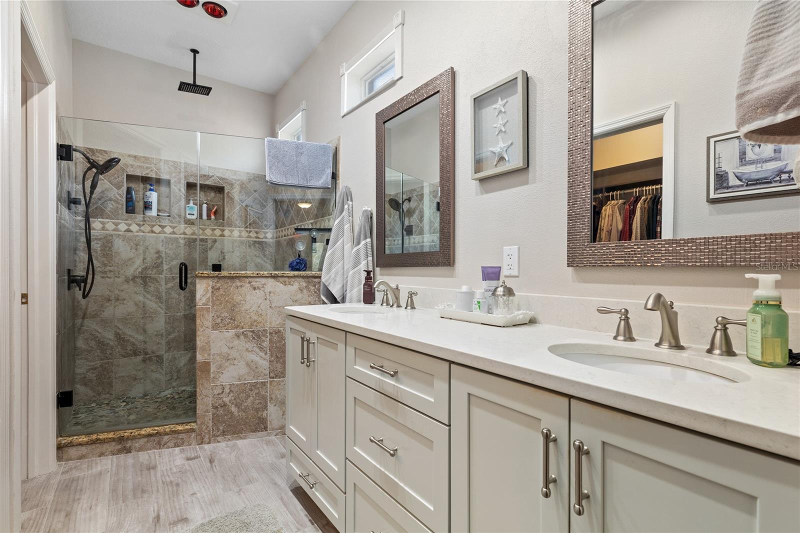 PRIMARY BATHROOM WITH WALK-IN SHOWER AND DOUBLE SINKS