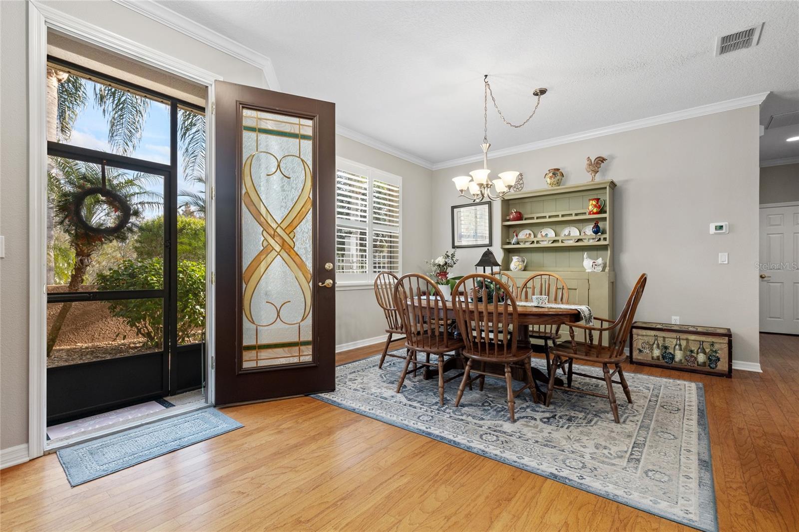 FRONT ENTRANCE WITH BEAUTIFUL GLASS FRONT DOOR