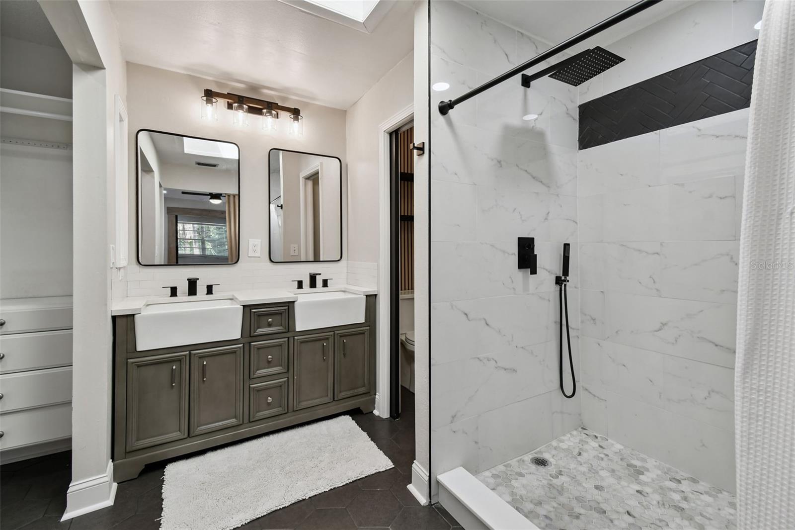 Double Sinks, Separate water closet, separate linen closet and Upgraded Shower