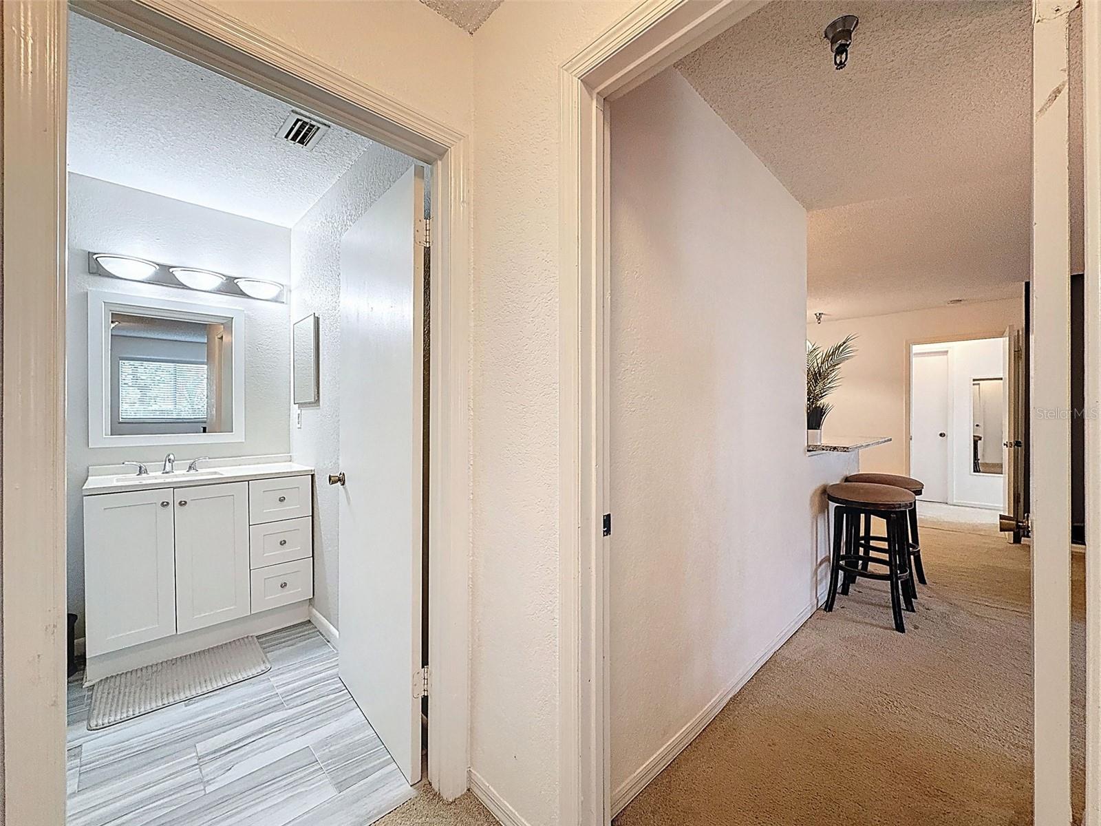 2nd Bedroom looking into Living Room/2nd Bathroom