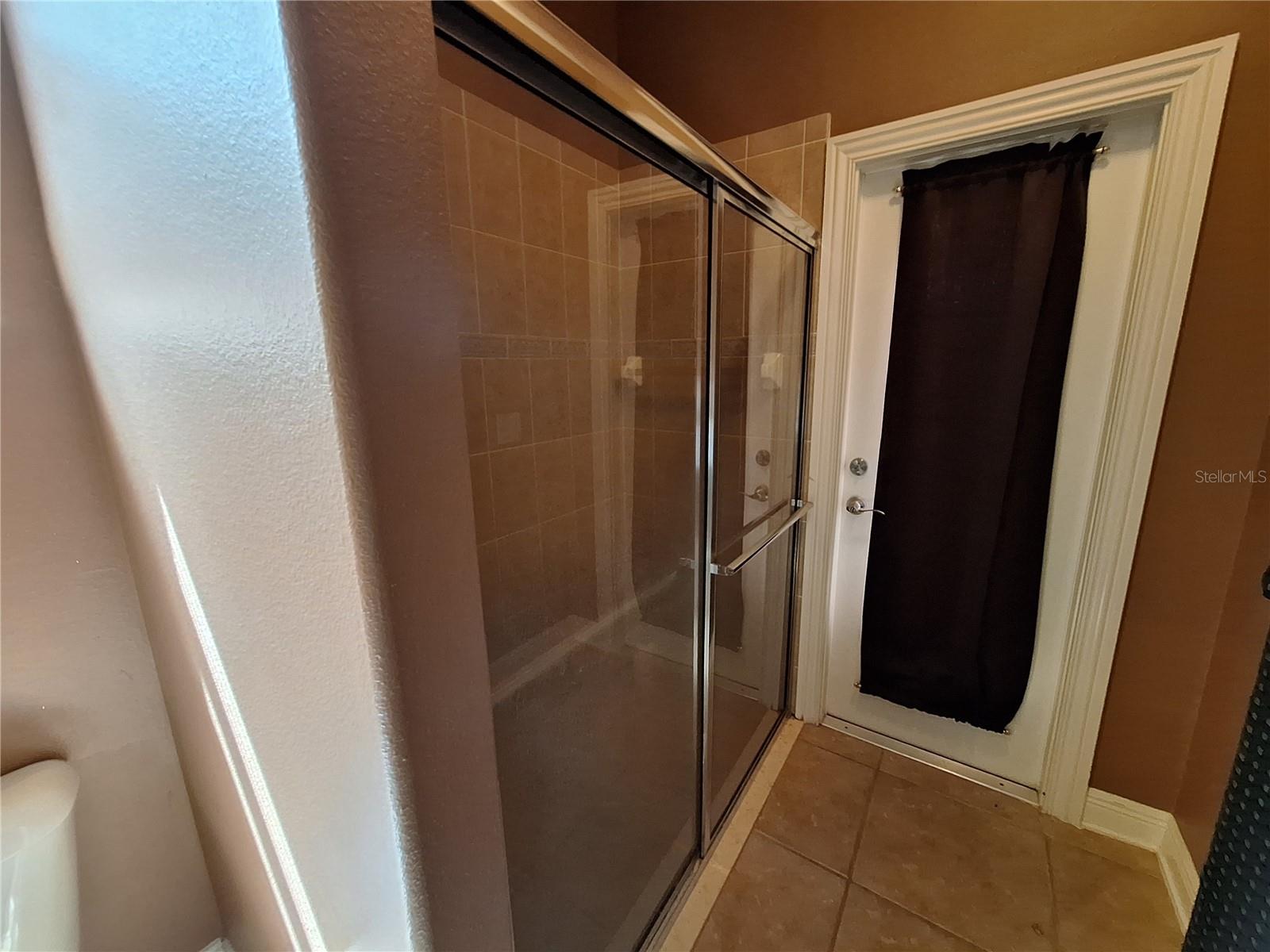 This Bath has Shower and a door to back yard