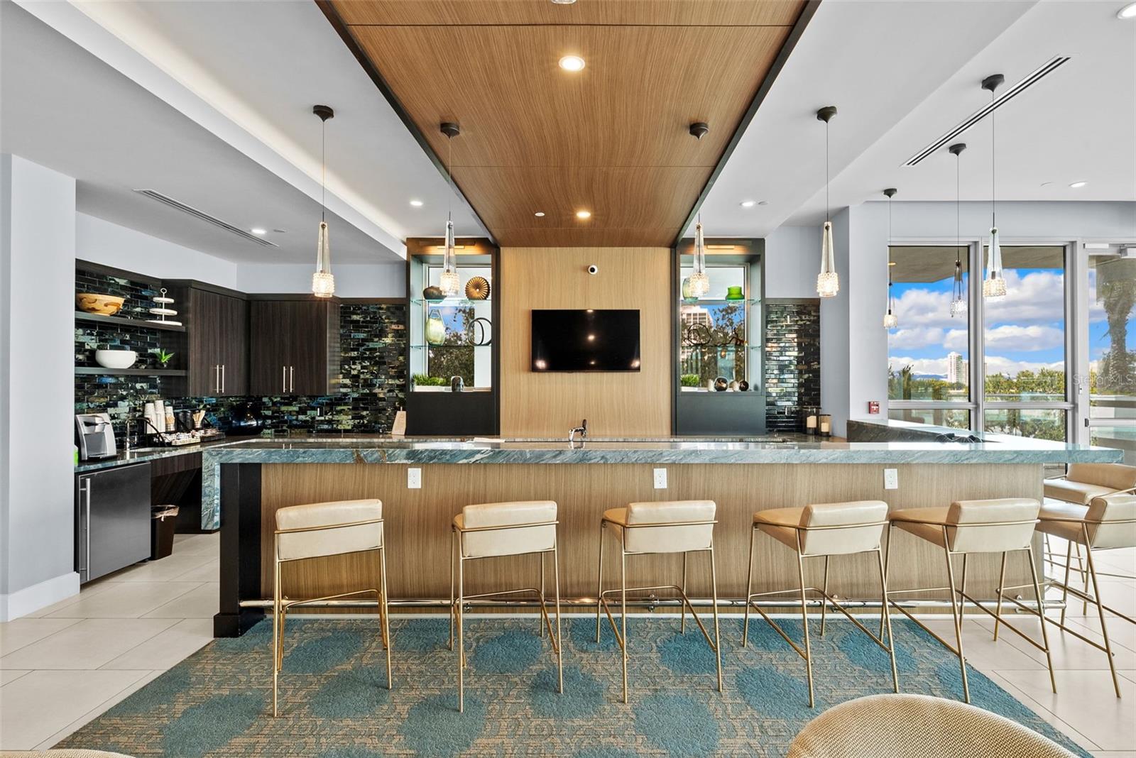 3rd Amenity Level Community Room with bar and daily coffee station