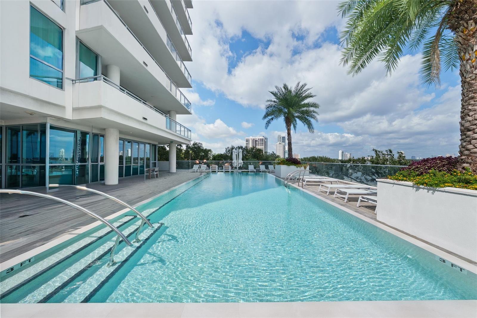 Resort style pool and sun deck overlooking Bayshore