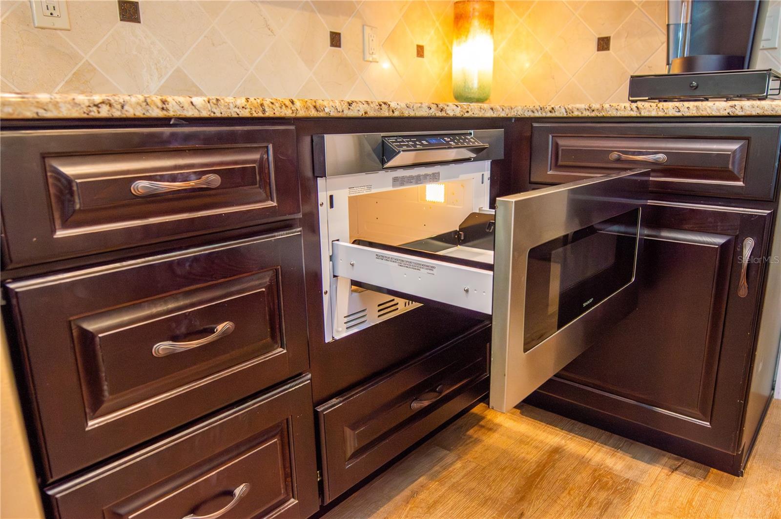 Microwave opens for easy reach.