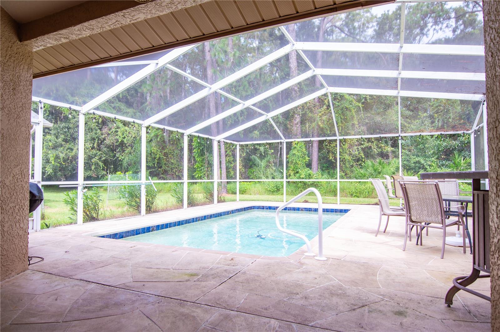 12 x 24 inground pool and large covered/screened patio