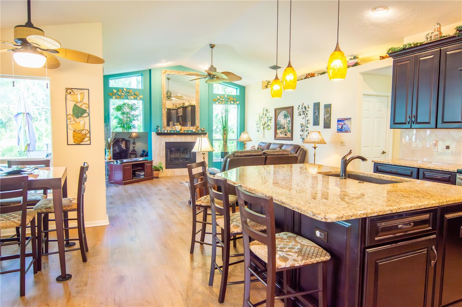 Eat-in kitchen area and barstools for larger families or entertaining.