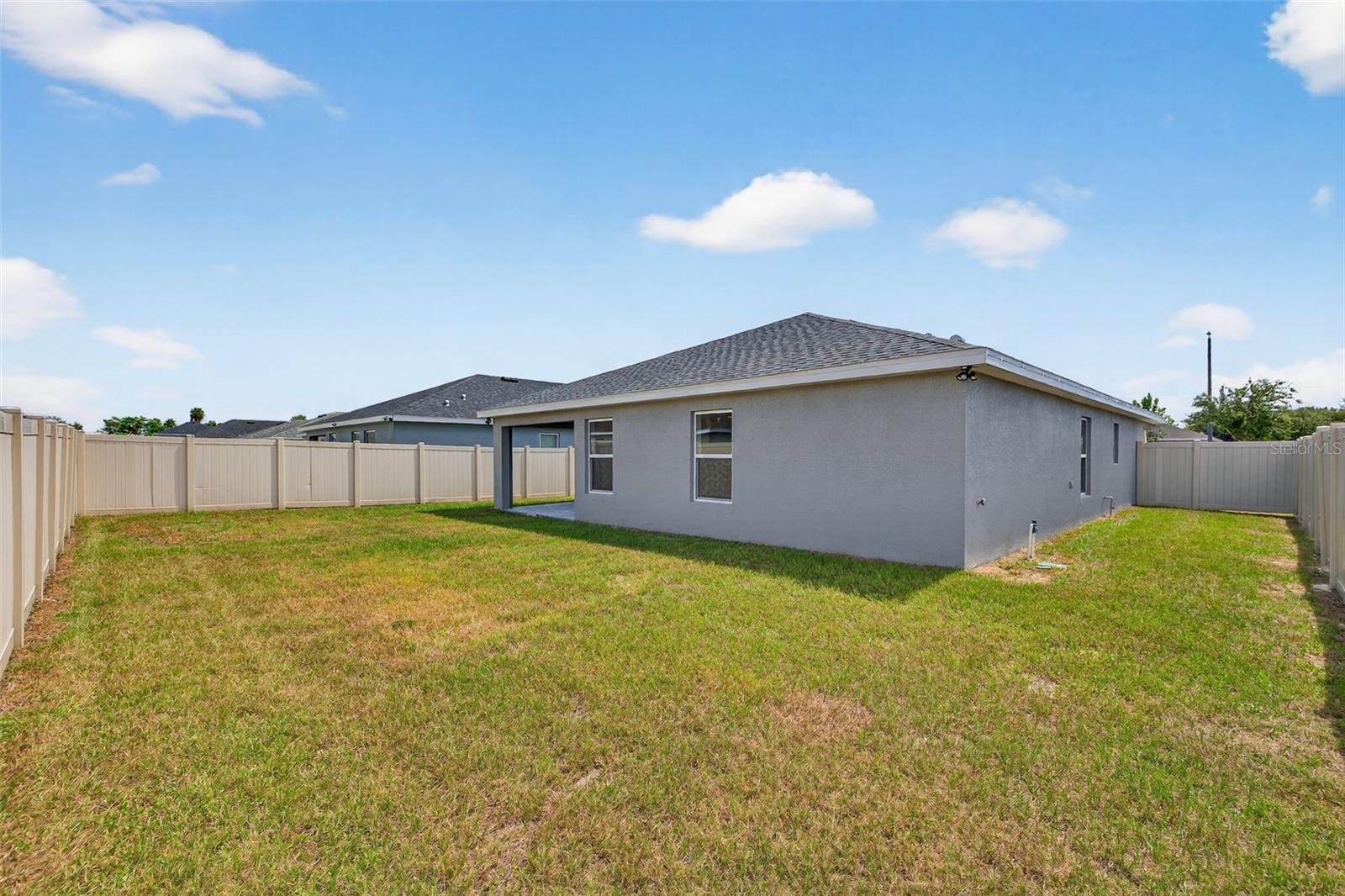 Back Exterior/Fenced Yard