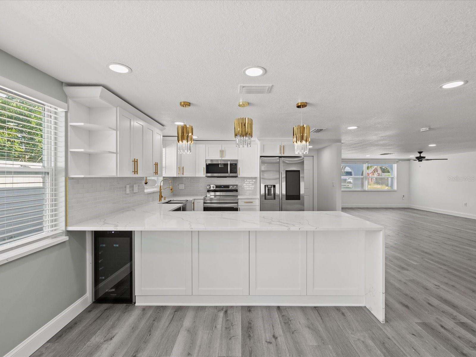 Kitchen showing wine fridge