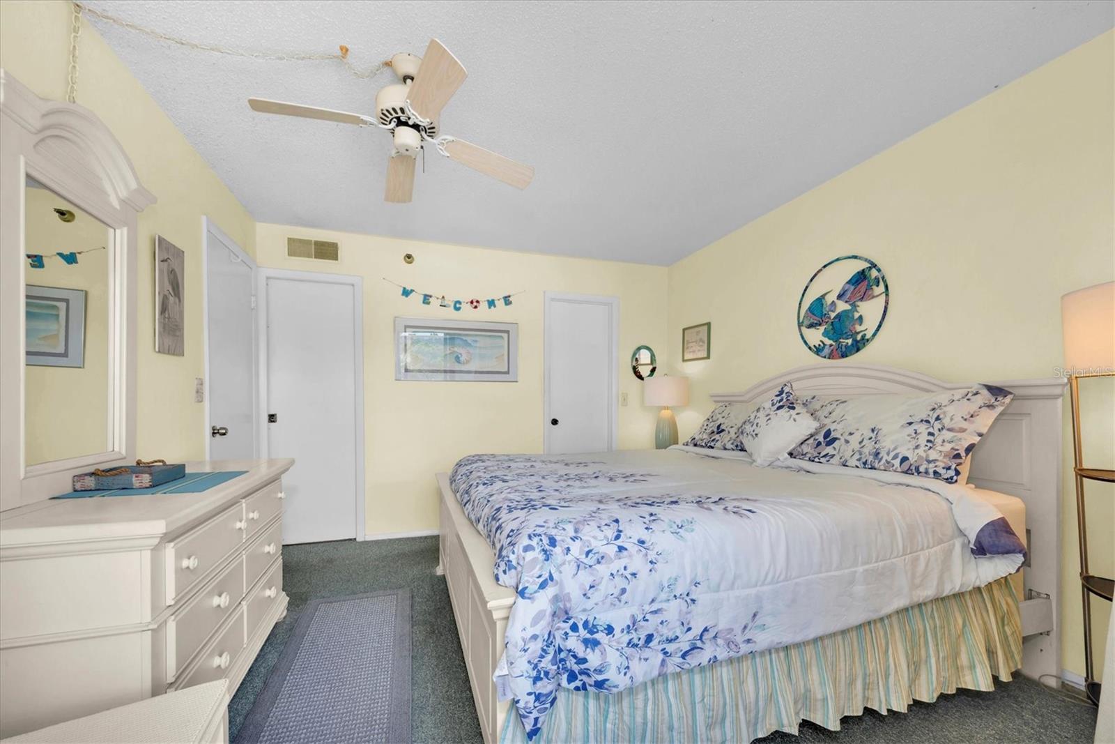 Primary bedroom with balcony access