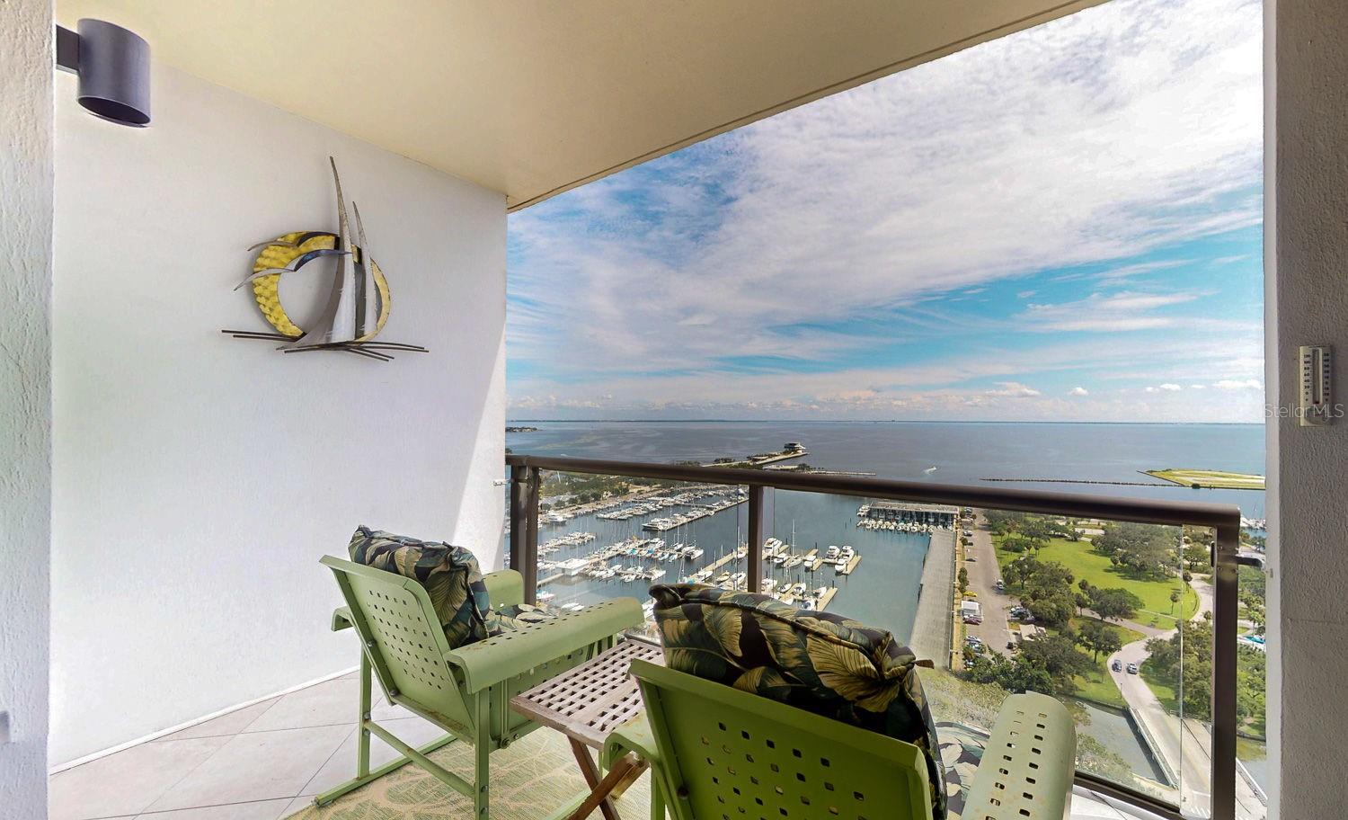 Oversized covered balcony with views of St Petersburg Pier, Tampa Bay and Downtown St Petersburg parks