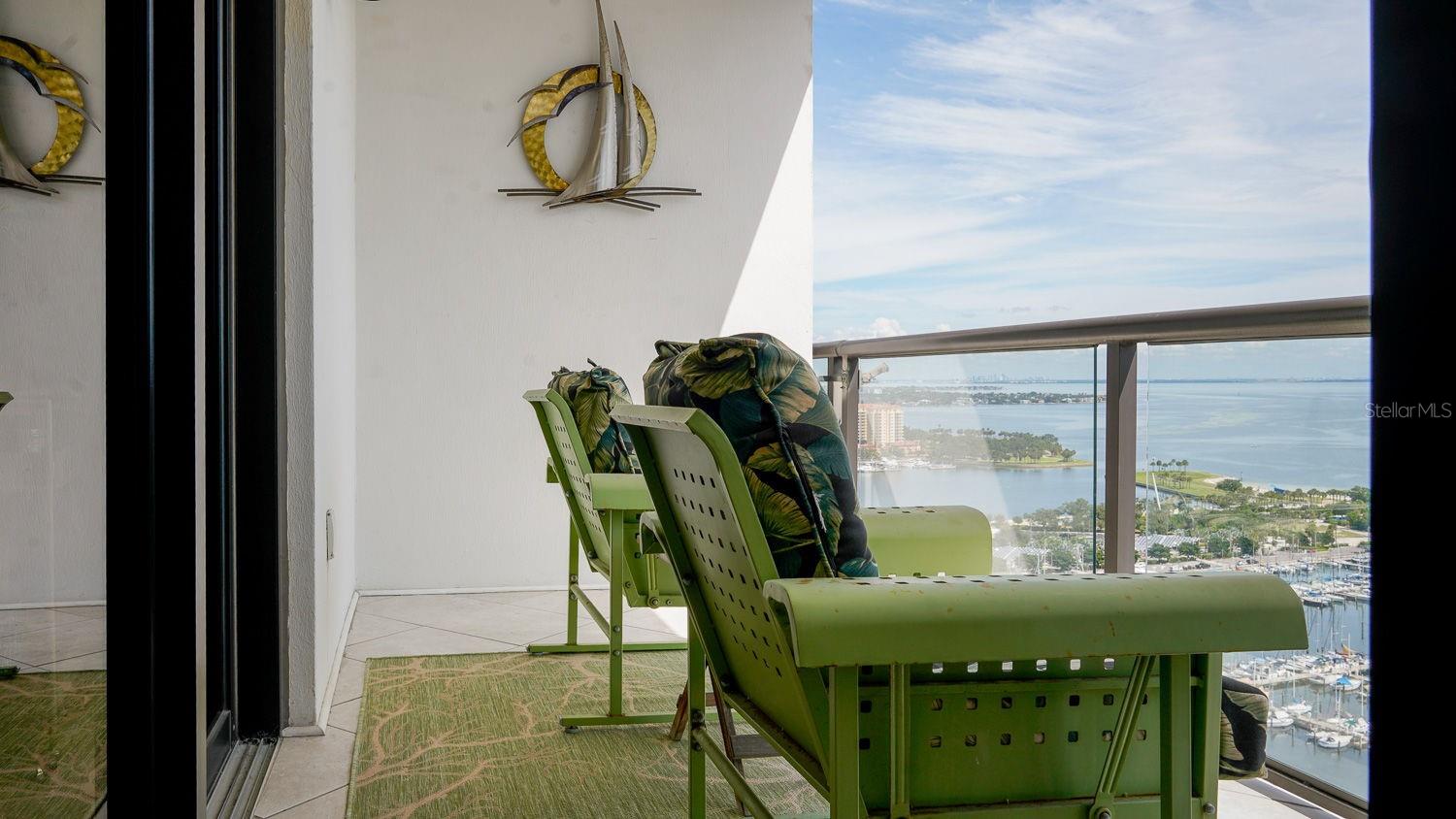 Oversized covered balcony with views of St Petersburg Pier, Tampa Bay and Downtown St Petersburg parks