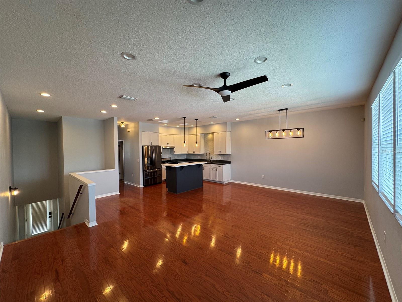 open concept kitchen, dining and family room