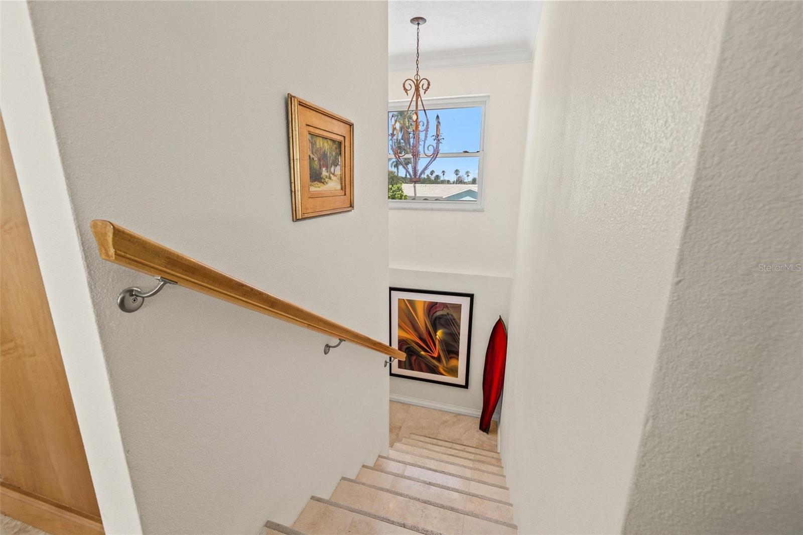 Stairs from foyer to second floor
