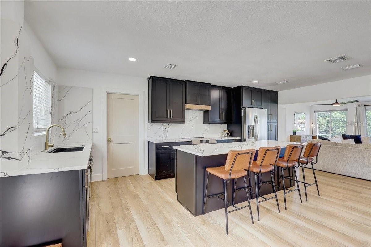 Kitchen with solid wood cabinets and quartz countertops