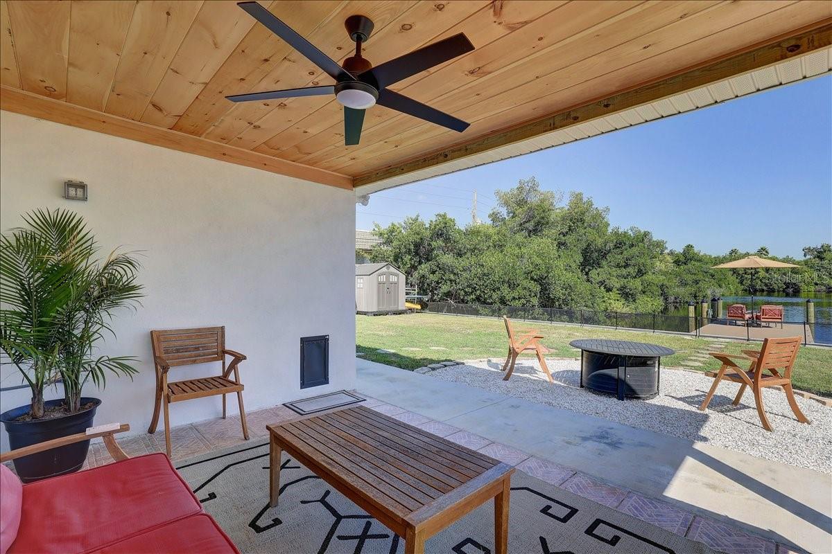 Back patio with power, ceiling fan, and lighting