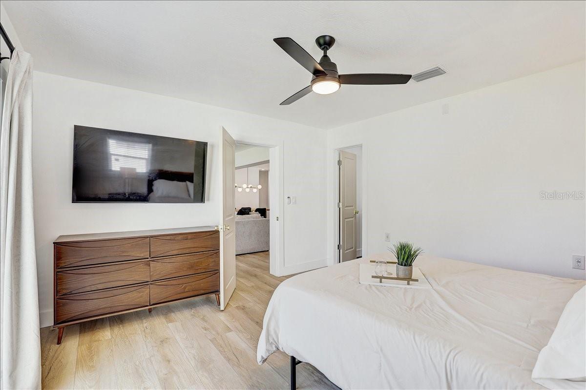 Primary bedroom (55 inch tv shown)