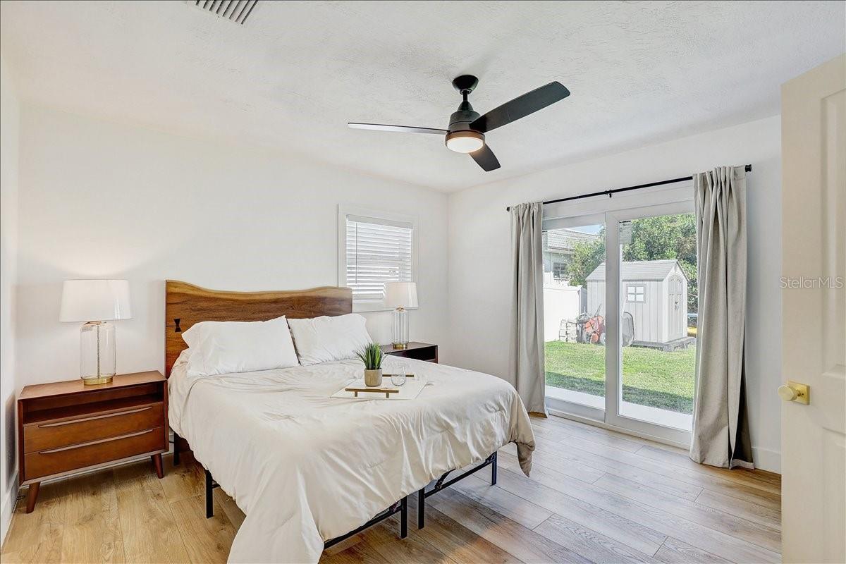 Primary bedroom (queen size shown with oversized night stands)