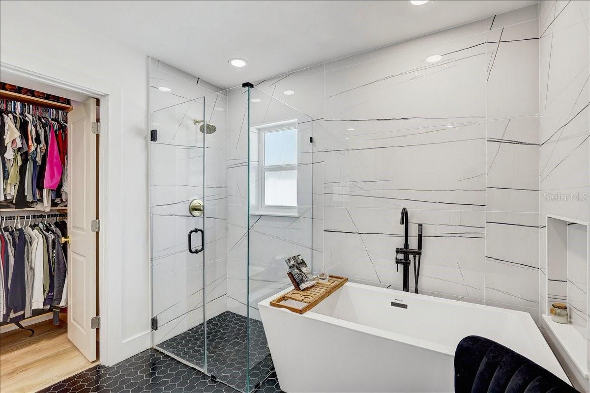 Walk-in shower and separate stand-alone tub