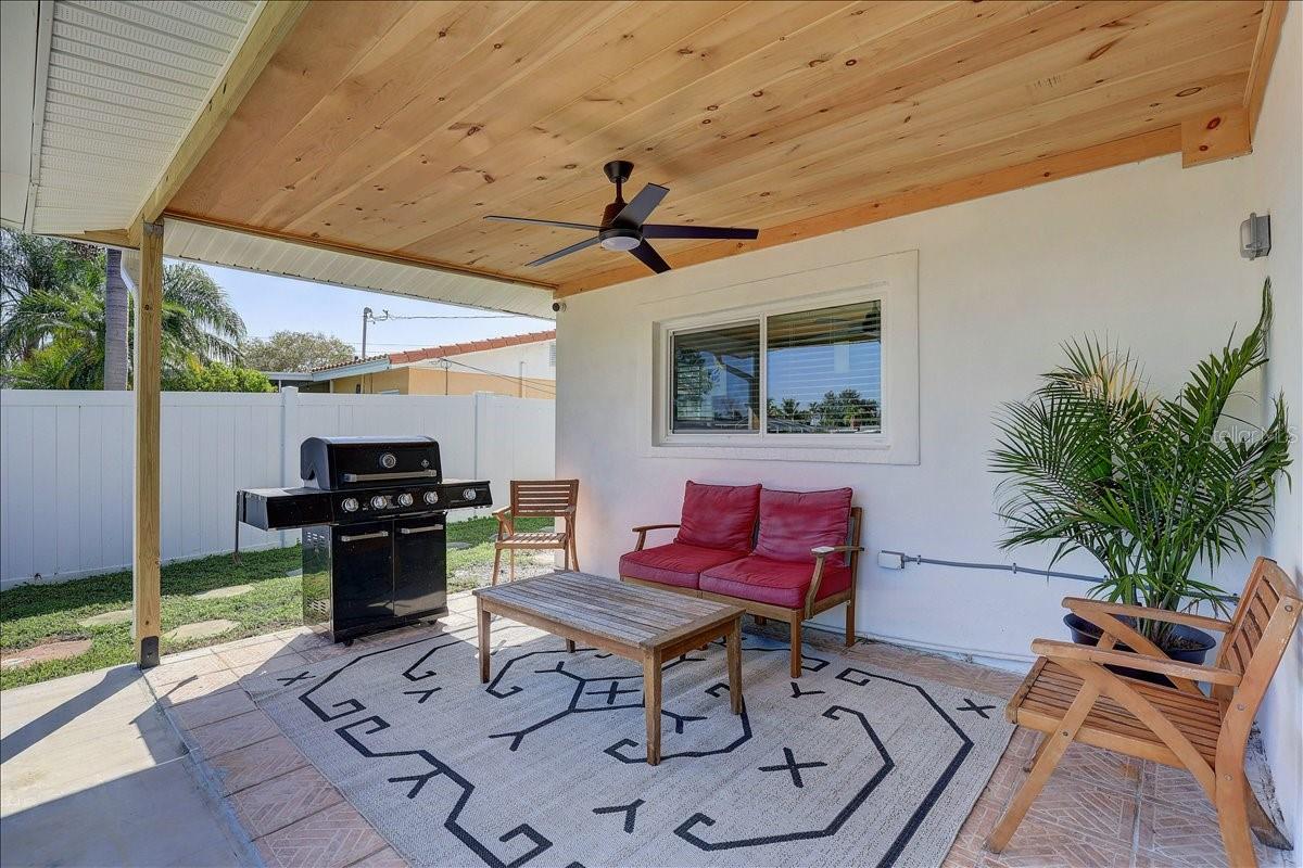 Back patio with power, ceiling fan, and lighting
