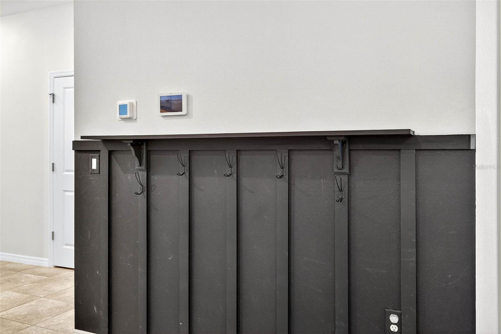 Accent wall perfect for additional storage.