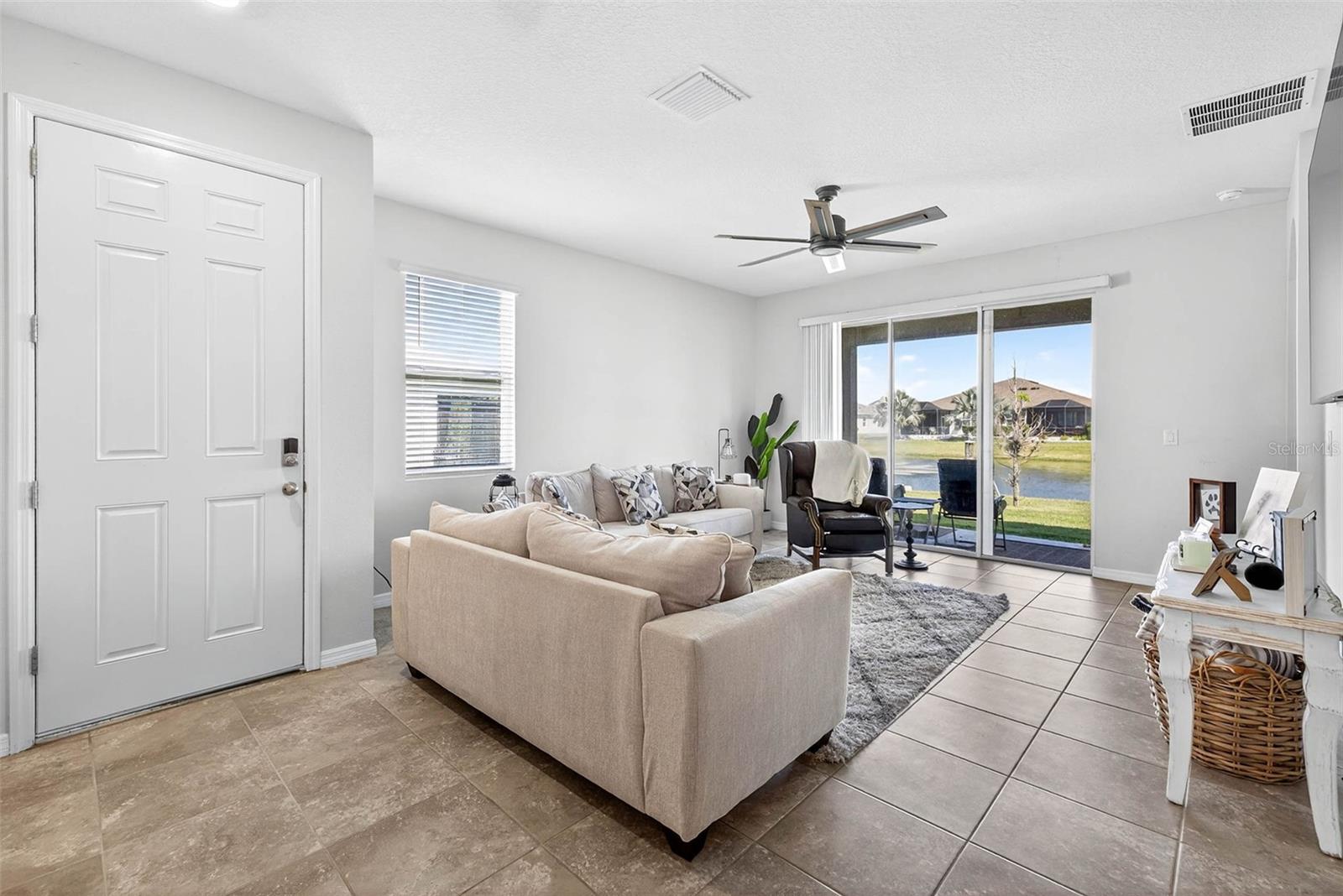 Step inside to tall ceilings, tile floors, and stunning sunlight.