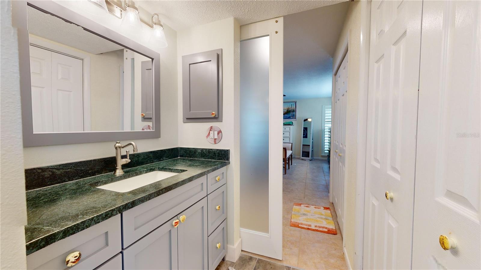 Primary ensuite bathroom with standing shower