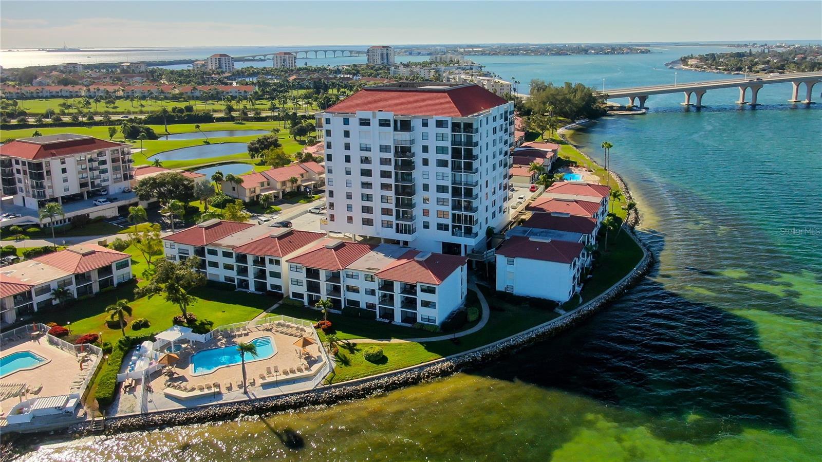 Located right on Boca Ciega Bay on an Island with the Isla Del Sol Country Club golf course running through it