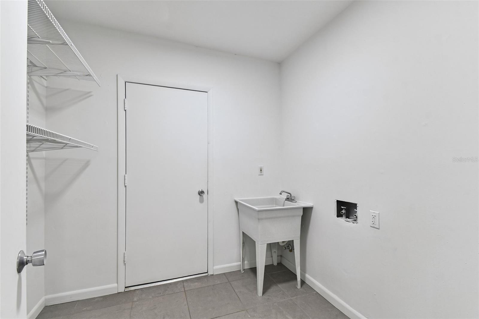 Laundry Room leading towards the garage.