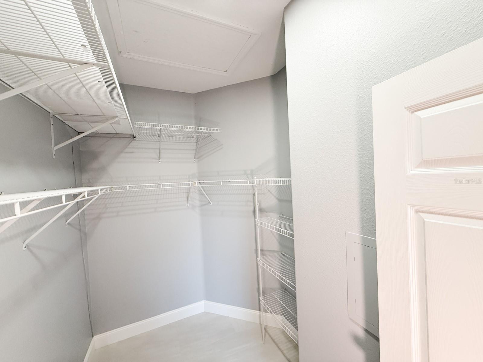 primary bedroom walk-in closet