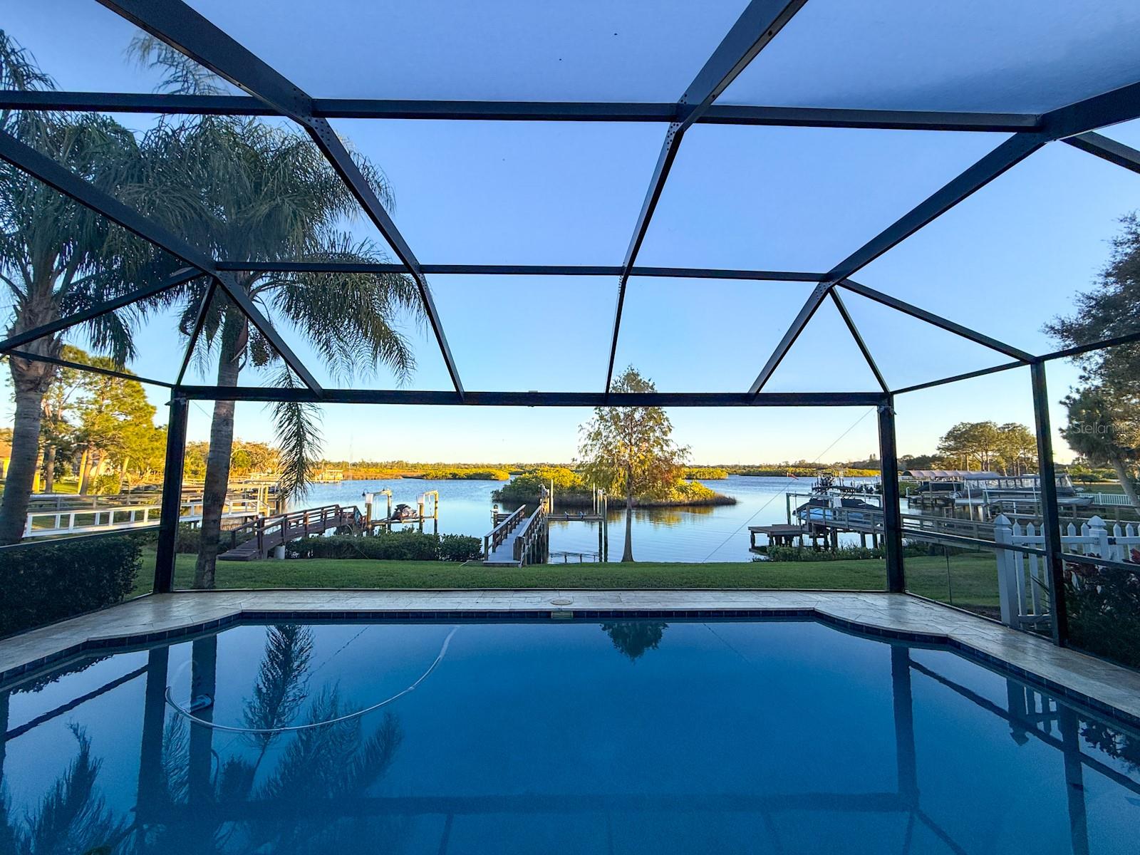 view from lanai and pool overlooking the pristine Anclote Delta