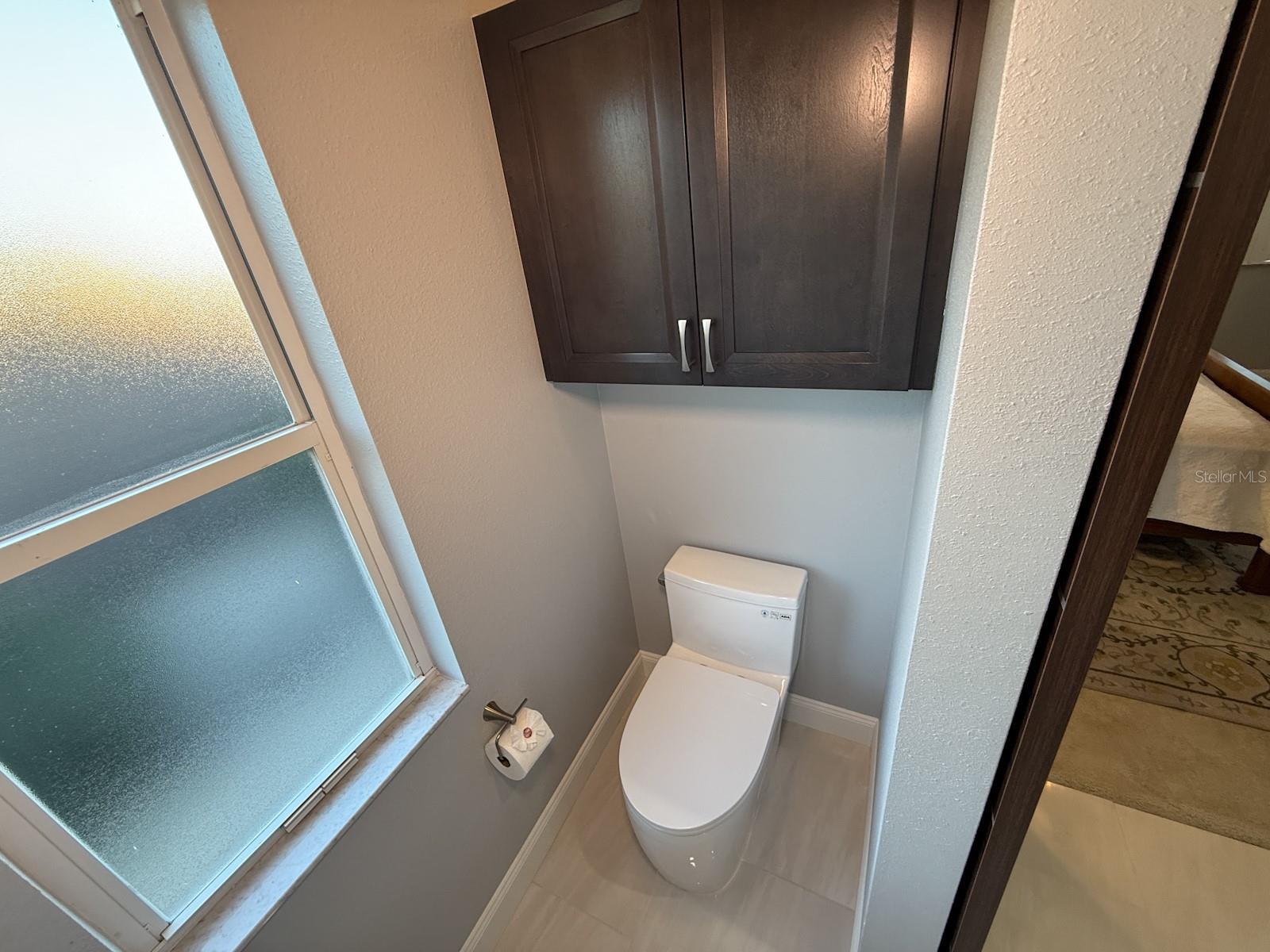 primary bath with updated commode
