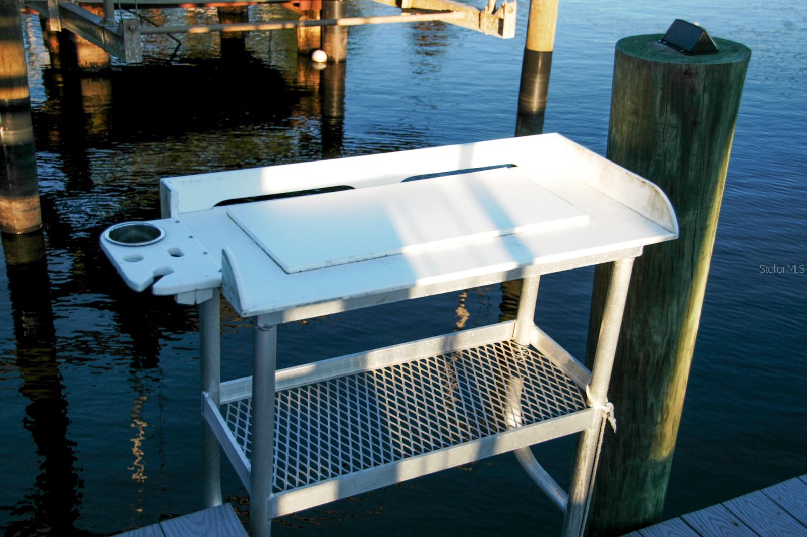 custom fish cleaning station and water supply on dock