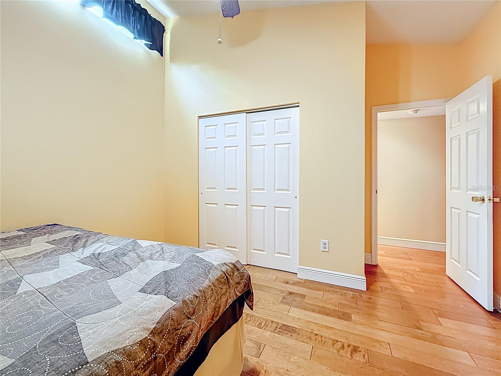 Second bedroom with high ceilings