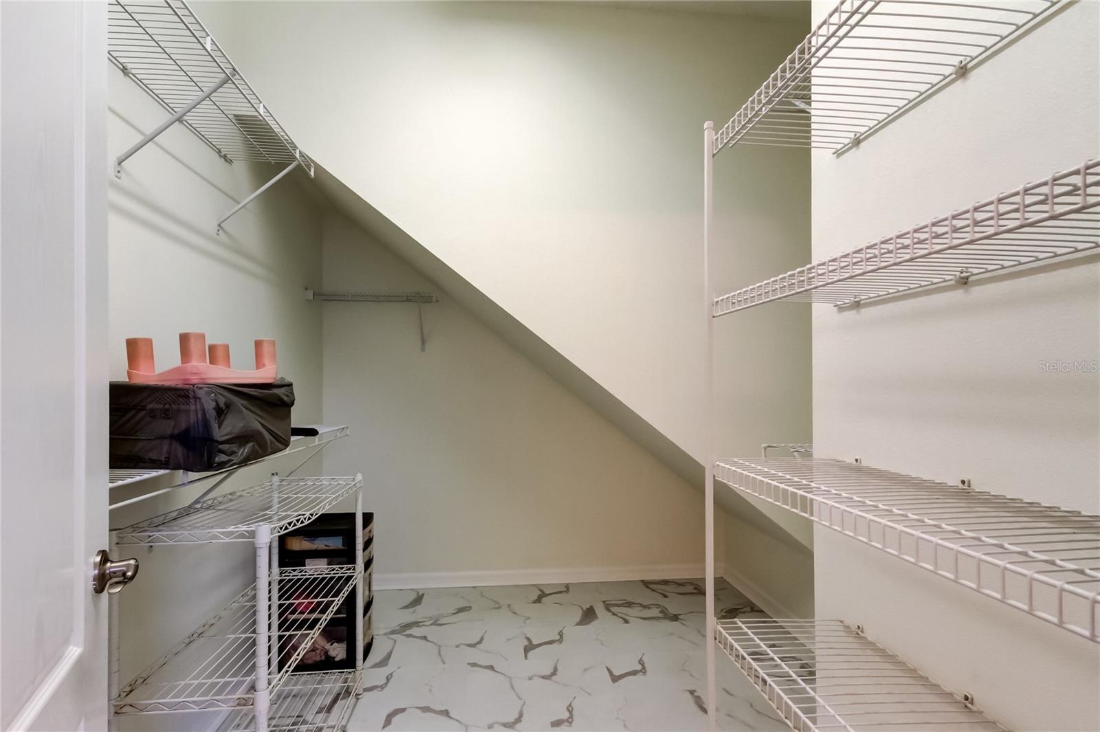 huge walk in closet in primary bedroom