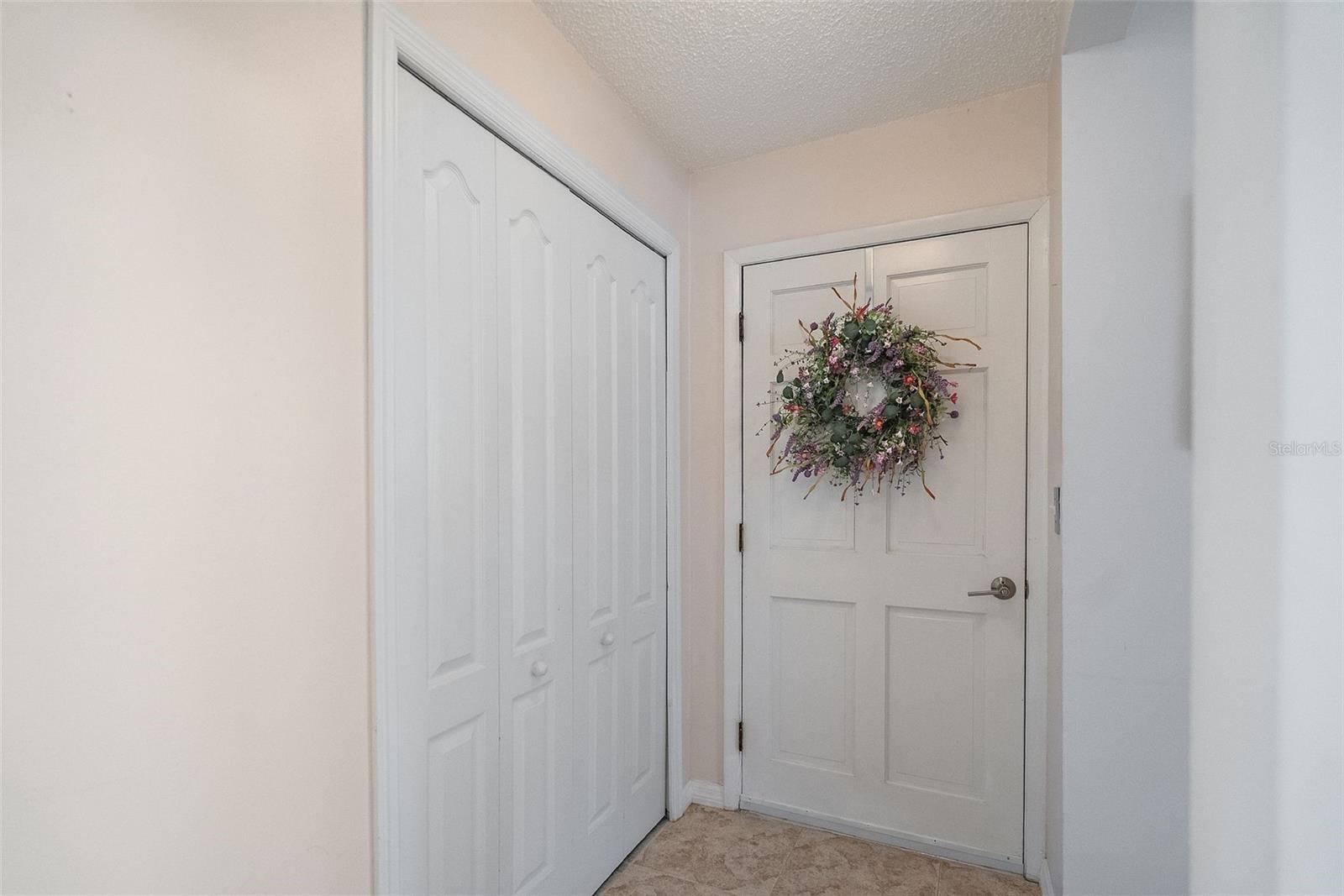 Front Door and Storage Closet