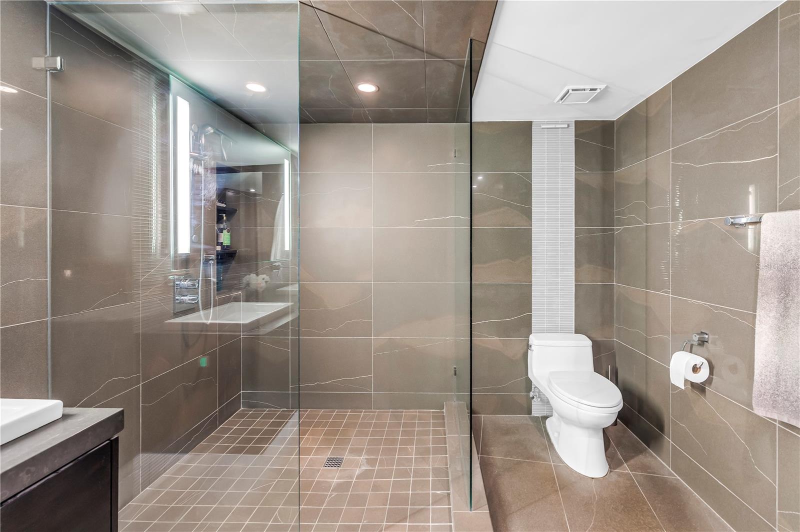 master bath with large walk in shower