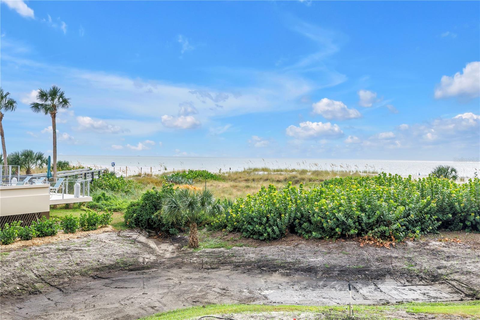 full disclosure:  The Lido is reworking and refreshing the landscaping and will soon be green and beautiful!  No water intrusion or damage to Unit 113 from last year's storms..113 is a second level unit with garage below on the ground level.