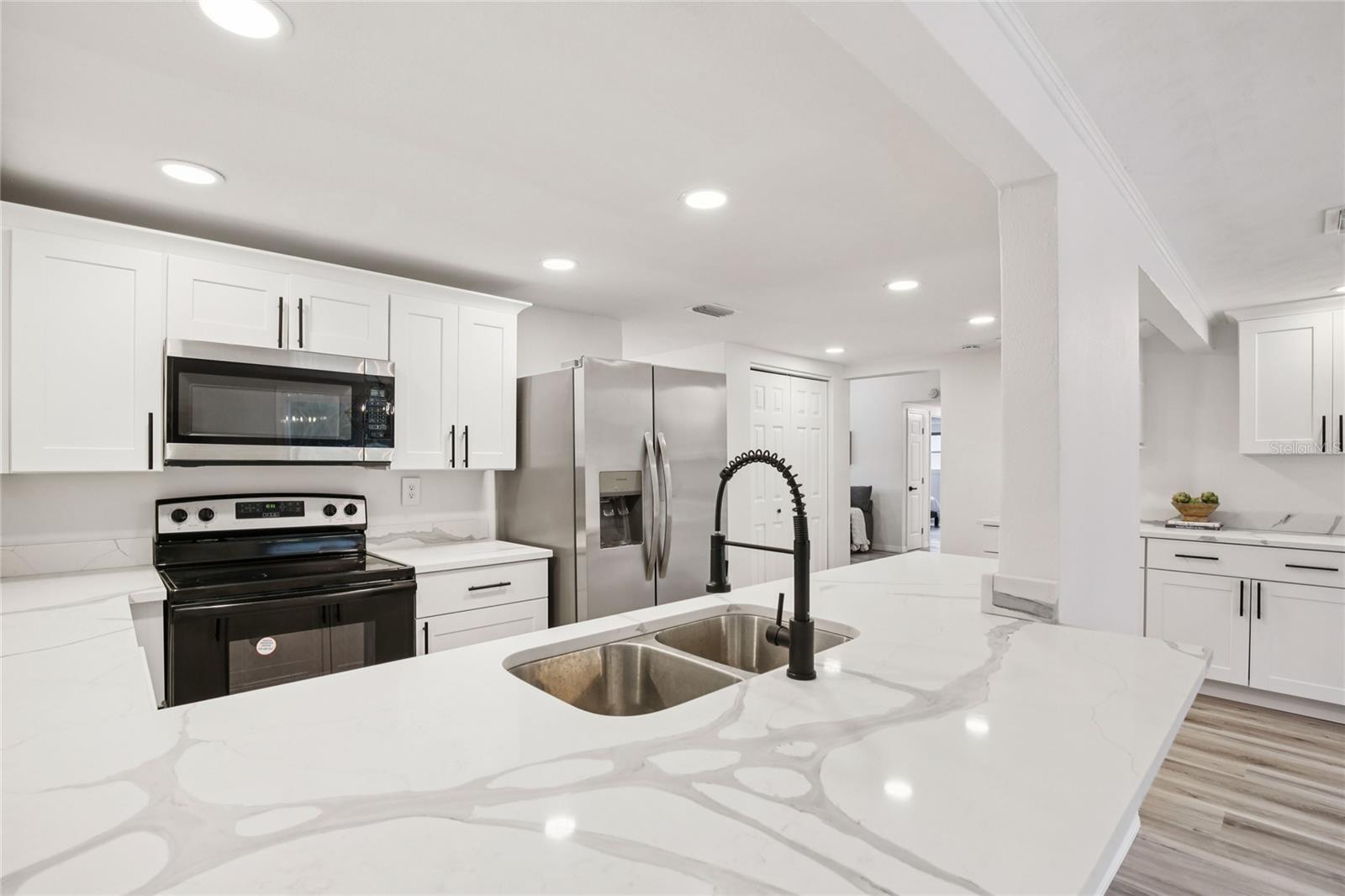 Stainless steel appliances and modern fixtures