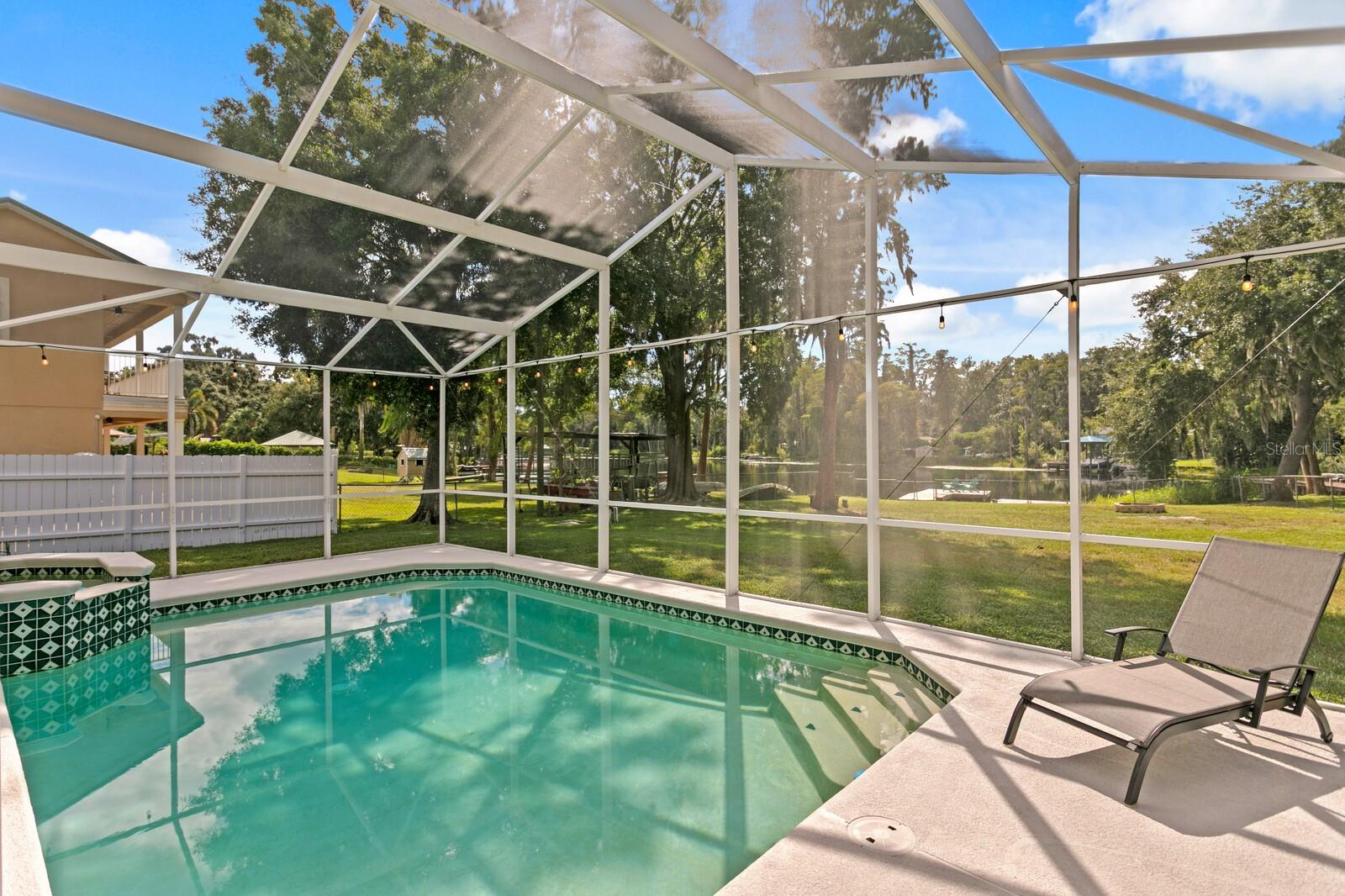 Enjoy lake views from your private pool