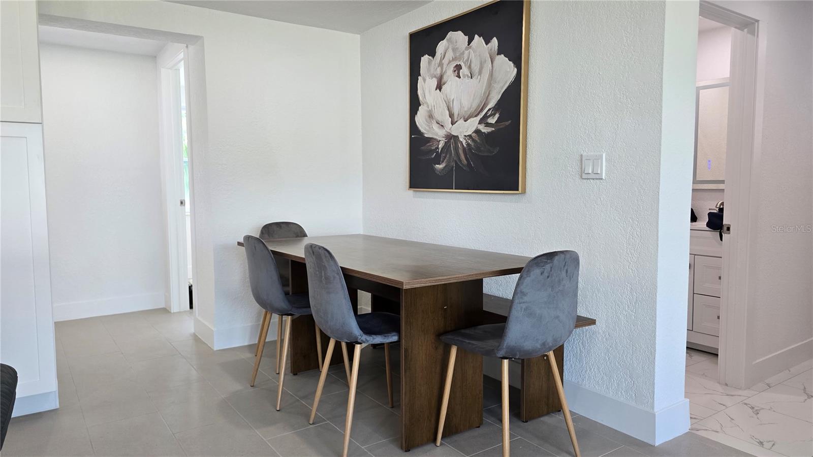 Table and chaors and dining bench come wiht the house